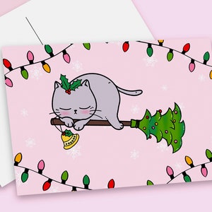 2 of Christmas broom cat coming to town postcards