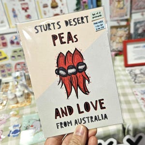2 of Sturt's desert pea pun postcards