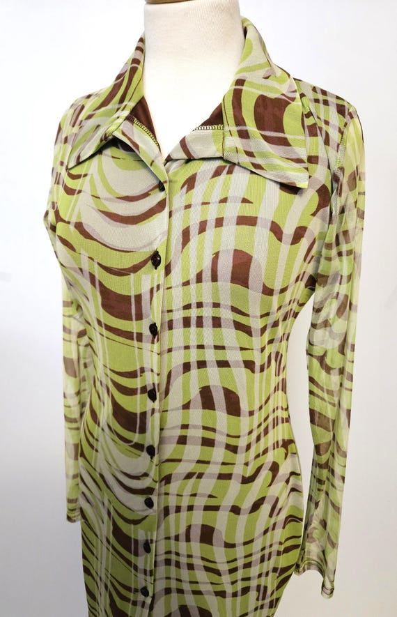 long sleeve fit and flare maxi dress BCBG MAXAZRIA Long Sleeve Fit and Flare Maxi Dress with Cut Outs