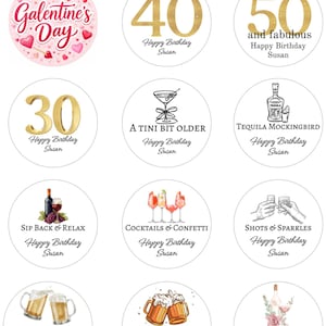 May include: A collection of edible toppers with various designs. Includes toppers for Galentine's Day, milestone birthdays (30, 40, 50), and cocktail-themed celebrations. Each topper features text like "Happy Birthday Susan".