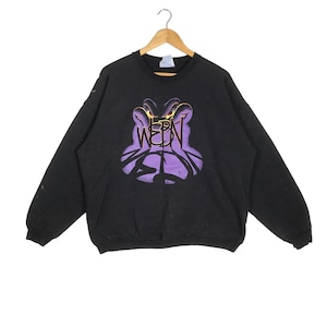 May include: Black sweatshirt with a purple and yellow graphic of a creature with the word "WEBN" printed on it.