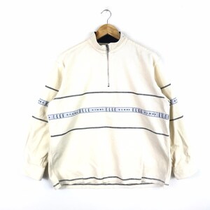 May include: A white long-sleeve sweater with a half-zip closure and horizontal black stripes. The sweater has the text "ELLE HOMME" repeated across the stripes.