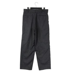 May include: Grey pinstripe trousers with a straight leg and a button fly.