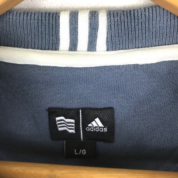 Drie strepen De beroemde ADIDAS THREE STRIPES Impossible Is Drie strepen De beroemde ADIDAS THREE STRIPES Impossible Is