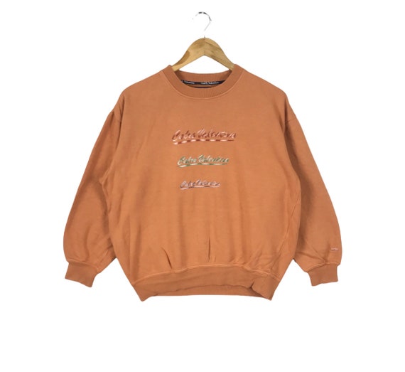 Orange designer sweatshirt 2025