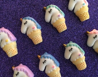 May include: Eight unicorn ice cream cone charms in various pastel colours. The charms are made of white ceramic with a unicorn head and horn, and a yellow ice cream cone with a waffle texture.