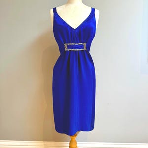 Vintage 1970s indigo blue satin dress. Elegant evening dress from the mid century modern era