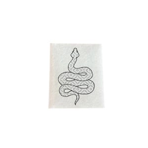 May include: A black and white line drawing of a snake with a patterned body, coiled in a spiral shape.