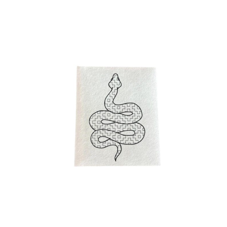 May include: A black and white line drawing of a snake with a patterned body, coiled in a spiral shape.