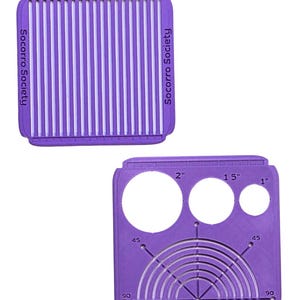 May include: A white ceramic mug with a black handle and the text "But First, Coffee" in a bold, black font. The mug is set against a blurred background, suggesting a cozy setting.