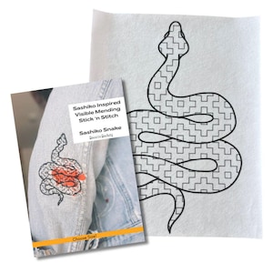 May include: Sashiko Inspired Visible Mending Stick 'n Stitch Sashiko Snake pattern on a white background. The pattern is a snake with a square grid design. The text "Sashiko Snake" is printed on the pattern.