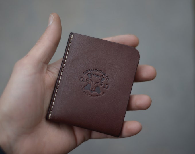 Thumb slide wallet