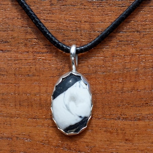 White Buffalo Turquoise Cabochon Pendant Set in Fine Silver.