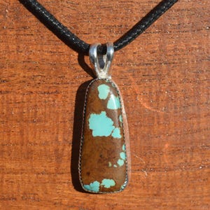 Royston Turquoise Cabochon Pendant Set in Fine Silver.