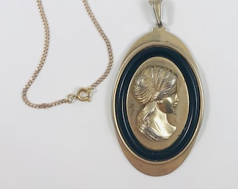Avon Silhouette Pendant Necklace - Gold-Tone Oval Greek Cameo with Black Frame - 1975
