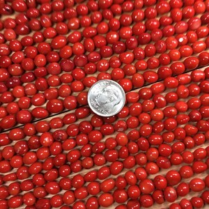 Red Coral,   Small potato shape, approximately 5-7mm. 15&quot; strand, 1mm hole, sold per strand OR per lot ( 25 pcs).