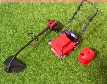 tiny toy lawn mower