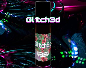 May include: A cylindrical perfume oil bottle with a black cap and a label featuring a floral pattern, the text Gl1tch3d, and the text Andromeda's Curse Perfume Oil - 10ml. The bottle is centred against a dark, abstract background with neon pink and green lights.