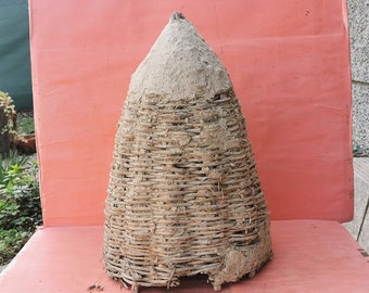 Old antique primitive hand made bee swarm beeskep bee hive