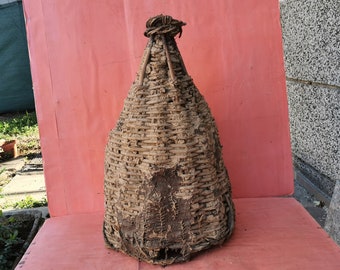 Old antique primitive hand made bee swarm beeskep bee hive