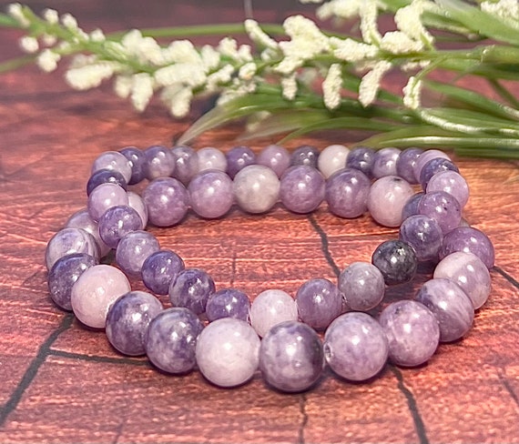Jet Beautiful Lepidolite Round Beads Stretch Bracelet Free 40 Page Booklet  on Jet International Crystal Therapy A++ Natural Genuine : Amazon.in:  Health & Personal Care