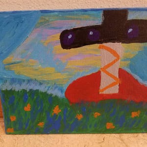 May include: A painting of a red and orange abstract shape with a black and purple shape above it. The background is a blue sky with yellow and white clouds. The bottom of the painting is a green field with orange flowers.