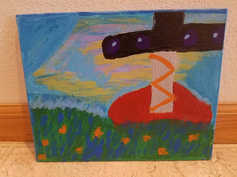 May include: A painting of a red and orange abstract shape with a black and purple shape above it. The background is a blue sky with yellow and white clouds. The bottom of the painting is a green field with orange flowers.