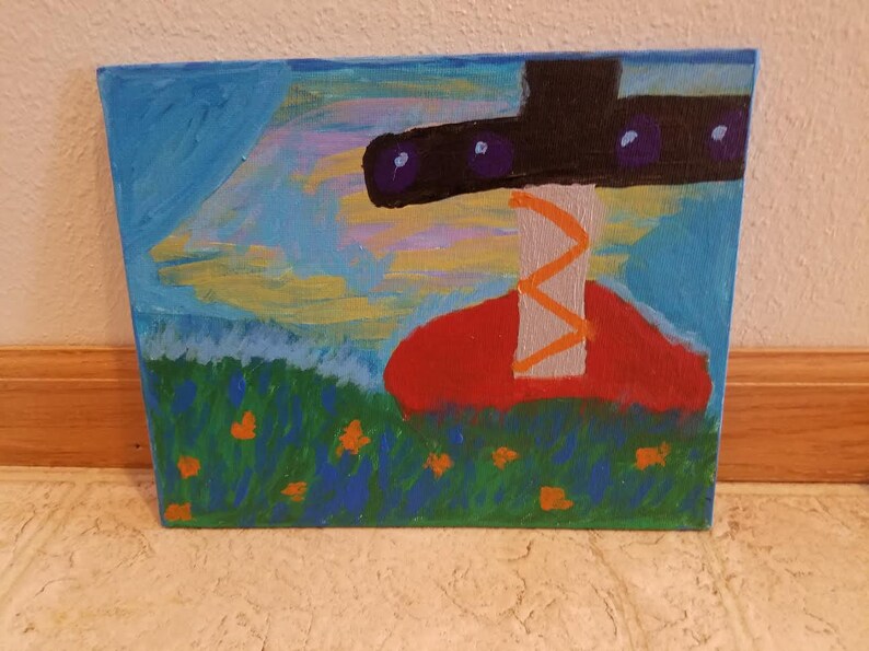 May include: A painting of a red and black mushroom with a white stem and orange stripes. The mushroom is in a field of green grass with blue flowers and orange dots.