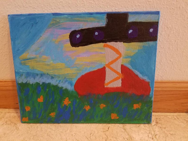 May include: A painting of a red and orange abstract shape with a black and purple shape on top. The background is a blue sky with yellow and white clouds. The bottom of the painting is a green field with orange flowers.