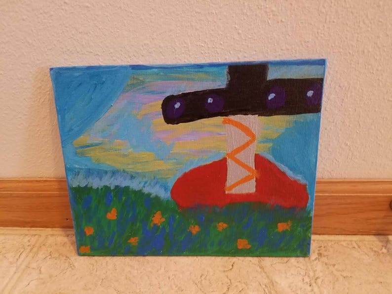 May include: A painting of a red and orange abstract shape with a black and purple shape above it. The background is blue with yellow and white brushstrokes. The painting is on a canvas.