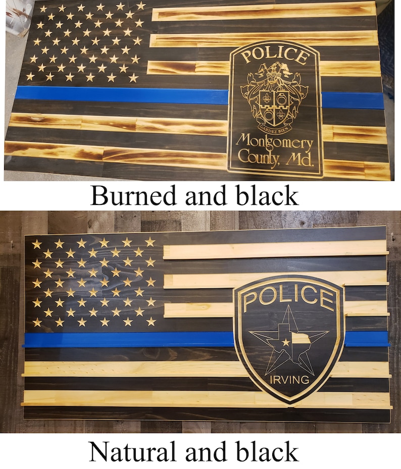 K&ouml;nnte beinhalten: Amerikanische Holzflagge mit blauem Streifen und Polizeikennzeichen. Die Flagge zeigt Sterne und Streifen, mit einer blauen Linie, die die Strafverfolgung darstellt. Das Abzeichen ist mit den Worten "POLICE" und "Montgomery County, Md." graviert.