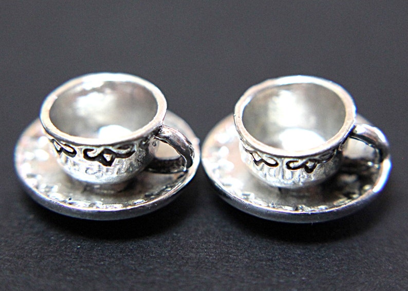 A Vintage Four-Piece 925 Sterling Silver Dollhouse Miniature Tea Set for Two