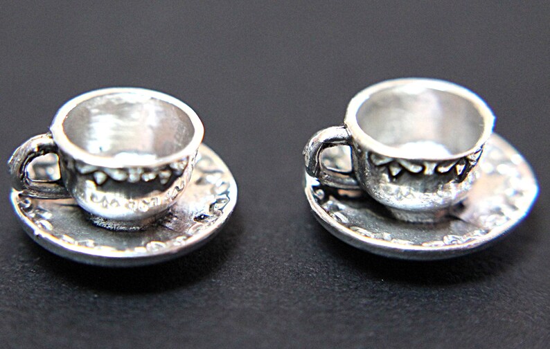 A Vintage Four-Piece 925 Sterling Silver Dollhouse Miniature Tea Set for Two