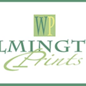 May include: The image displays the text "WILMINGTON Prints" in a green, elegant font, with a stylized "Prints" in a cursive script. Above the text is a green square with the letters "WP" in a serif font.