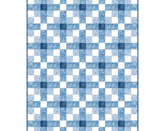 May include: A rectangular quilt featuring a grid pattern of alternating white squares and blue squares. The blue squares display varying shades of light and dark blue with a repeating floral print, creating a structured, geometric design.