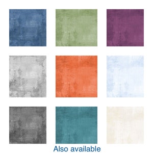 May include: Nine different colored square fabric swatches. The colors are blue, green, purple, gray, orange, light blue, dark gray, teal, and cream.