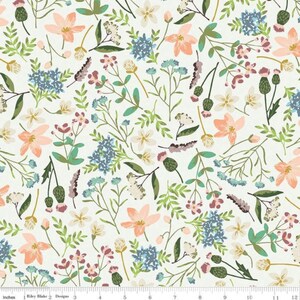 May include: A white fabric with a repeating pattern of pink, blue, and green flowers. The flowers are stylized and have a vintage feel. The fabric is perfect for quilting, crafting, or making home decor.