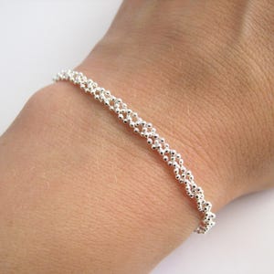 3-row braided bracelet with adjustable ball chain in solid 925 silver