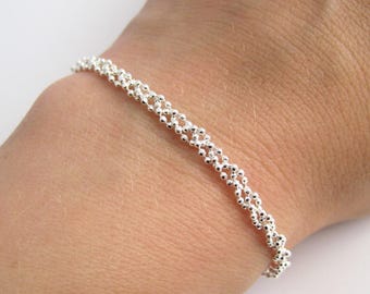 3-row braided bracelet with adjustable ball chain in solid 925/1000 silver