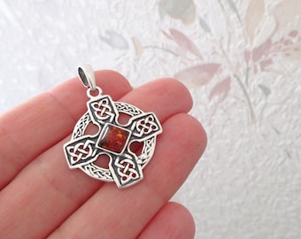 Openwork Celtic cross pendant with Baltic amber and 925 silver