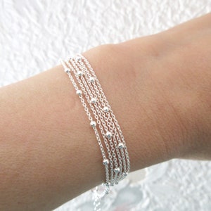 Cienka, potrójnie owijana, wielorzędowa bransoletka ze srebra próby 925