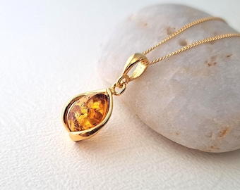 Pendant necklace with Baltic amber on a 24K gold-plated chain