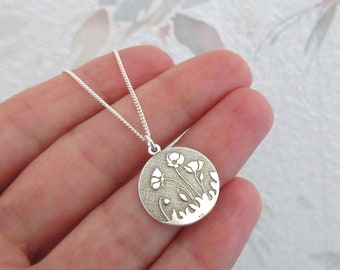 Women's necklace round pendant with poppies plant pattern flowers in 925/1000 silver