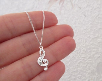 Small treble clef pendant necklace with engraved musical notes, minimalist, delicate, 925/1000 silver
