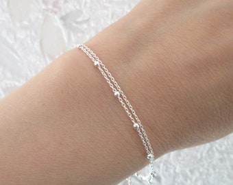 Thin double-chain multi-row bracelet in 925/1000 silver