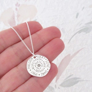 Irregular round pendant necklace engraved with talisman inscriptions in 925/1000 silver