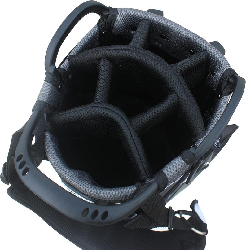 May include: A black and gray golf bag with multiple compartments for clubs. The bag has a sturdy handle and a shoulder strap for easy carrying. The interior is divided into sections to keep clubs organized.
