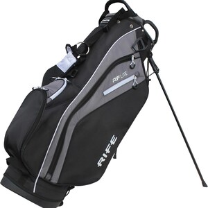 May include: Black and gray golf bag with the text "RIFE" and "RF LITE" in white. The bag has a stand, multiple zippered compartments, and a shoulder strap. The bag is angled, showing its side profile.