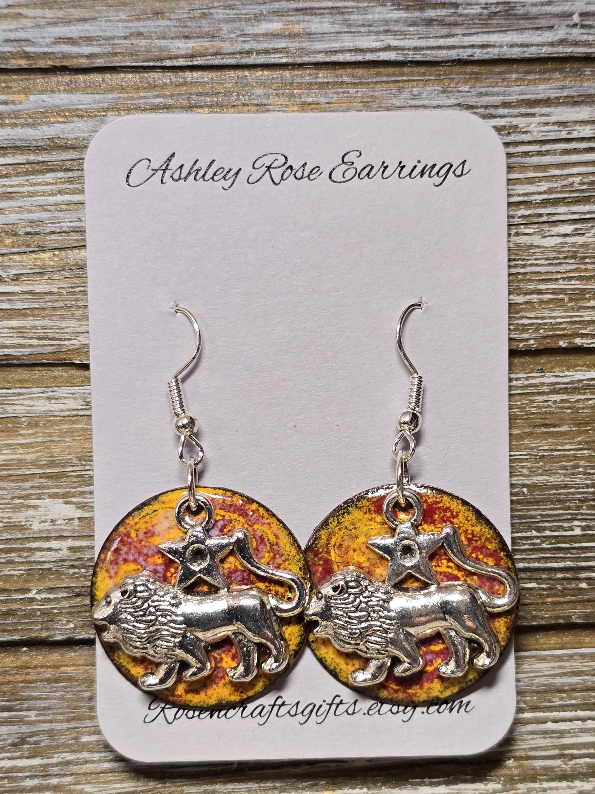 Leo the Lion with Orange, Yellow and Red background.