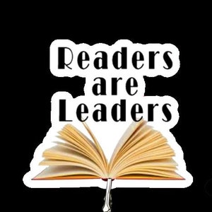 May include: An open book with the text "Readers are Leaders" on a white background. The book is open to show the pages inside.